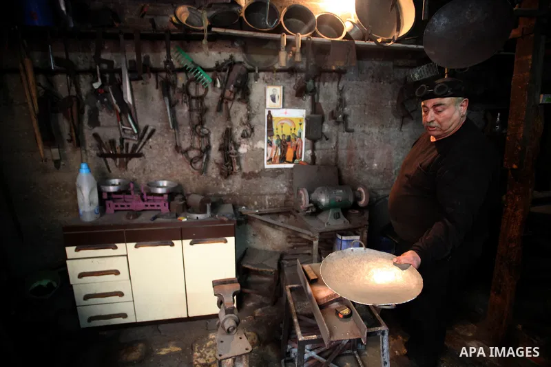 A Palestinian blacksmith works at his workshop in the village of Tarshiha, north Acre on January 21, 2014. Tarshiha was in the territory allotted to the Arab state under the 1947 UN Partition Plan. However, in the 1948 A...