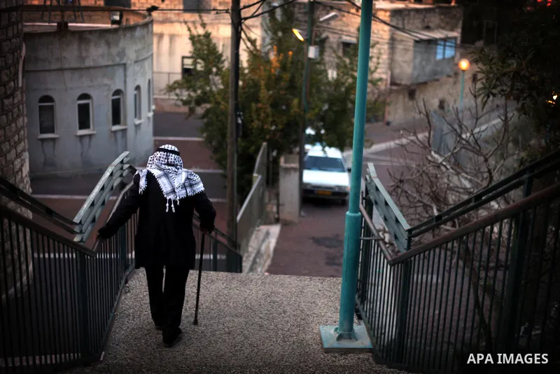 An elderly Palestinian man walks outside his house in the village of Tarshiha, north Acre on January 21, 2014. Tarshiha was in the territory allotted to the Arab state under the 1947 UN Partition Plan. However, in the 19...