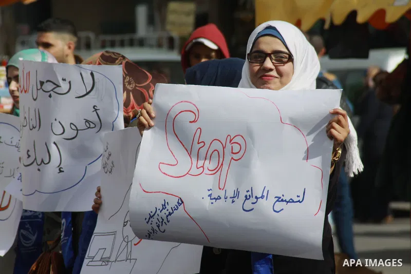 Palestinian students of the al-Najah University take part in a demonstration against the publication of porn movies on the Web sites in the West Bank city of Nablus, on, Jan. 23, 2014. Photo by Nedal Eshtayah