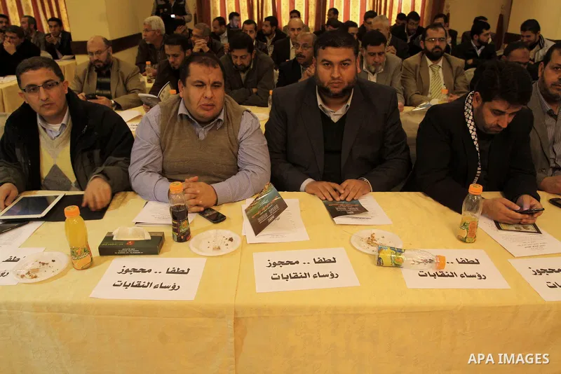 Palestinian members of unions and political parties attend a conference discusses the Palestinian rights, in Gaza City on January 23, 2014. Photo by Mohammed Asad