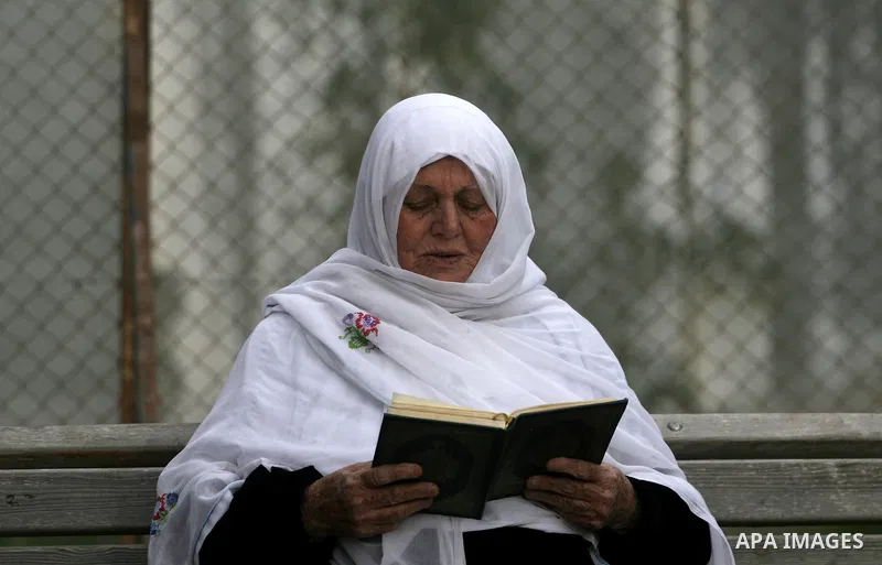 Palestinian pilgrims wait at the Rafah border terminal in the southern Gaza Strip to cross into Egypt, on Jan. 26, 2014. Photo by Eyad Al Baba