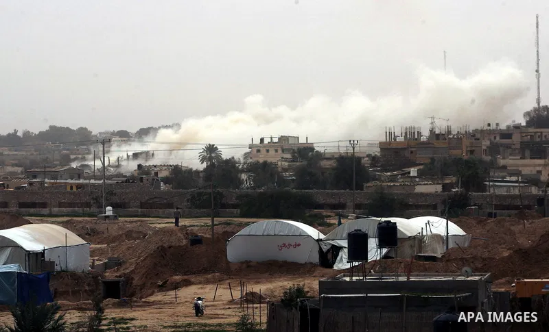 Smoke rises after an explosion during a military operation by Egyptian security forces in the Egyptian city of Rafah, near the border with southern Gaza Strip January 26, 2014. Egyptian security forces have stepped up a...