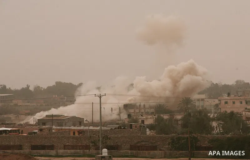 Smoke rises after an explosion during a military operation by Egyptian security forces in the Egyptian city of Rafah, near the border with southern Gaza Strip January 26, 2014. Egyptian security forces have stepped up a...