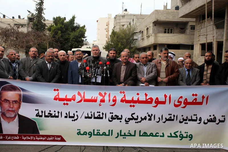 Palestinian members of National and Islamic forces hold a press conference at a protest against the U.S. decision to list Ziad al-Nakhaleh, the deputy secretary general of the Islamic Jihad movement, as a terrorist figur...
