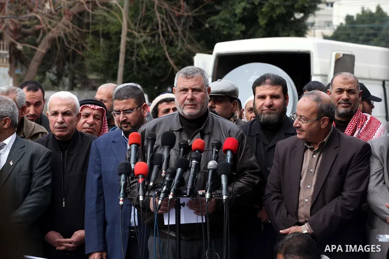 Palestinian members of National and Islamic forces hold a press conference at a protest against the U.S. decision to list Ziad al-Nakhaleh, the deputy secretary general of the Islamic Jihad movement, as a terrorist figur...