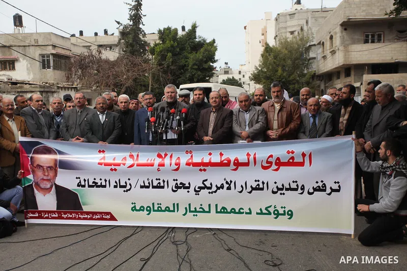 Palestinian members of National and Islamic forces hold a press conference at a protest against the U.S. decision to list Ziad al-Nakhaleh, the deputy secretary general of the Islamic Jihad movement, as a terrorist figur...