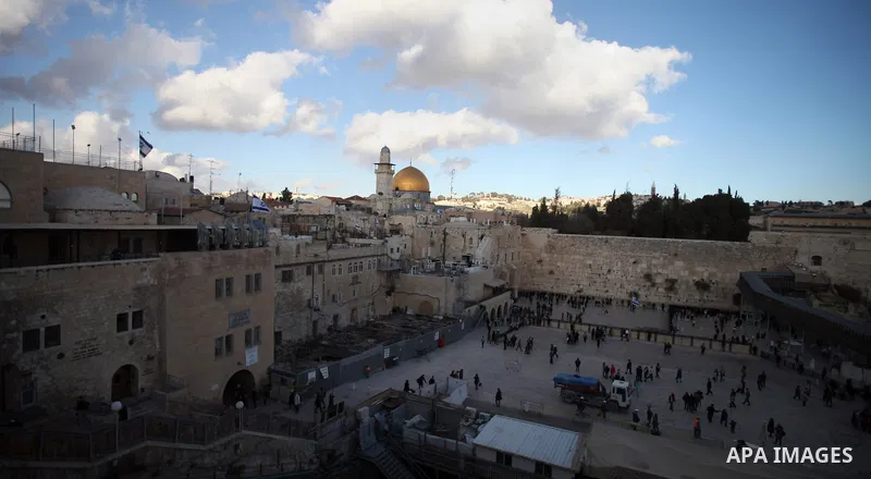 The Dome of the Rock mosque is seen as Israeli workers dig next to the Western wall in Jerusalem's Old City on January 28, 2014. The Al-Aqsa Foundation for Religious Endowments and Heritage said that Israeli authorities...