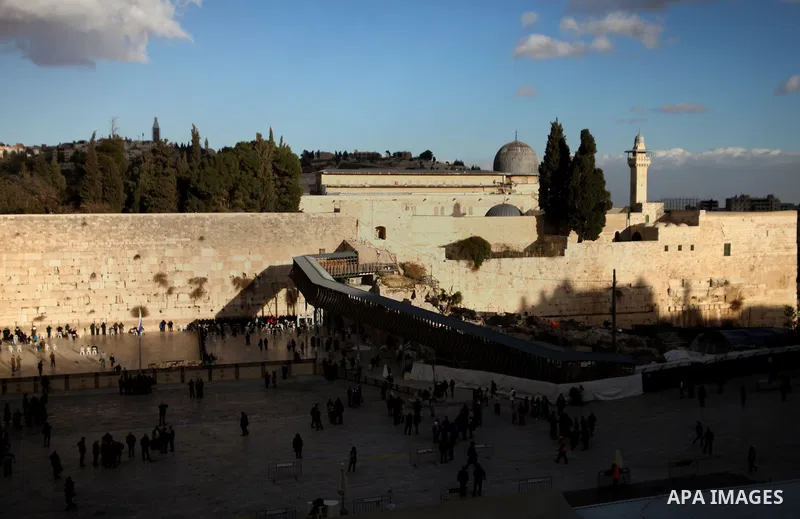 The Dome of the Al-Aqsa mosque is seen as Israeli workers dig next to the Western wall in Jerusalem's Old City on January 28, 2014. The Al-Aqsa Foundation for Religious Endowments and Heritage said that Israeli authoriti...