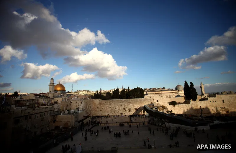 The Dome of the Rock mosque is seen as Israeli workers dig next to the Western wall in Jerusalem's Old City on January 28, 2014. The Al-Aqsa Foundation for Religious Endowments and Heritage said that Israeli authorities...