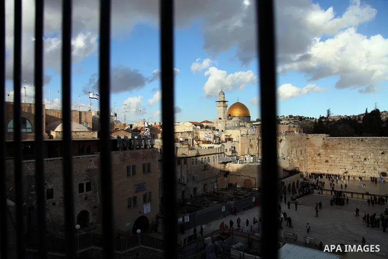 The Dome of the Rock mosque is seen as Israeli workers dig next to the Western wall in Jerusalem's Old City on January 28, 2014. The Al-Aqsa Foundation for Religious Endowments and Heritage said that Israeli authorities...