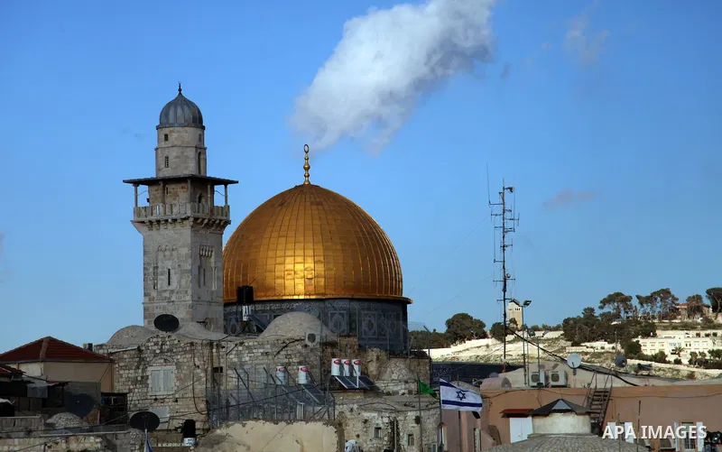 The Dome of the Rock mosque is seen as Israeli workers dig next to the Western wall in Jerusalem's Old City on January 28, 2014. The Al-Aqsa Foundation for Religious Endowments and Heritage said that Israeli authorities...