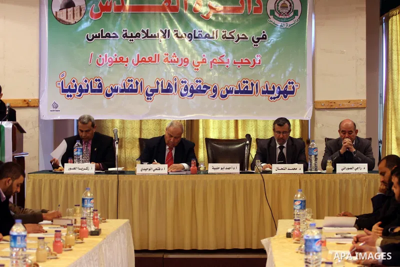 Palestinian jurists and human rights activists attend a conference discusses the judaization of Jerusalem by Israeli Authorities, in Gaza City on January 29, 2014. Photo by Mohammed Asad
