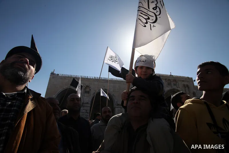 Palestinian supporters of Hizbut Tahrir, a conservative Islamic group shouts slogans during a rally in solidarity with Syrian revolution and against the Syrian President Bashar al-Asad, following Friday prayers at the Al...