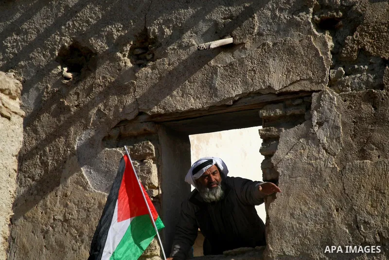 Palestinian activists work at the site of the old village known as Ein Hijleh, in the Jordan valley near the West Bank City of Jericho, Feb. 01, 2014. Hundreds of Palestinians announced today the launching of â??Melh Al-...