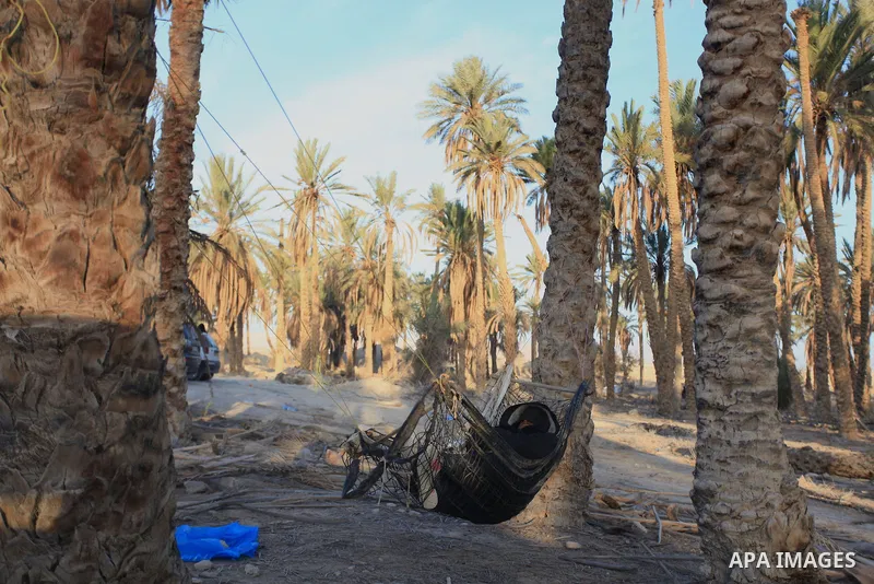 Palestinian and foreign activists sleep near an abandoned house in an old village known as Ein Hajla, in the Jordan Valley near the West Bank city of Jericho, Saturday, Feb. 1, 2014. Some 100 activists took part in a cam...