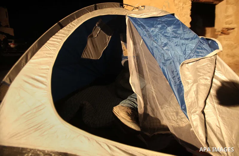 A Palestinian activist sleeps at a tent in the site of the old village known as Ein Hijleh, in the Jordan valley near the West Bank City of Jericho Feb. 01, 2014. Hundreds of Palestinians announced today the launching of...