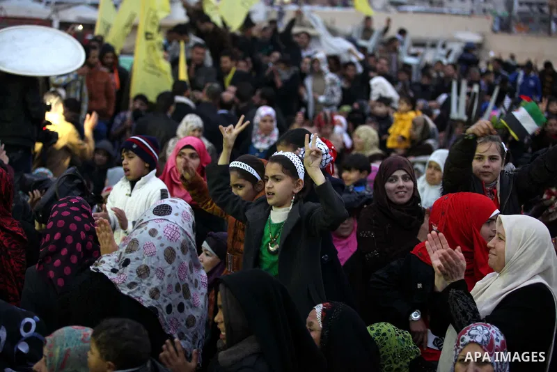 Palestinians attend a mass wedding ceremony in Gaza City on February 04, 2014. Nearly 50 Palestinians were married in the Gaza Strip in a mass wedding funded by the office of Palestinian President Mahmoud Abbas. Photo by...