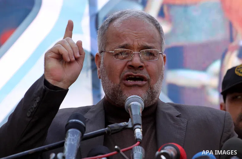 Palestinian Jihad Islamic leader, Khader Habeeb takes part in a protest in the Jebaliya refugee camp, the northern Gaza Strip, Friday, Feb. 7, 2014. Palestinian Hamas and Islamic Jihad supporters chanted slogans against...