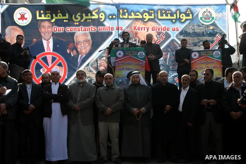 Palestinian Hamas and Islamic Jihad leaders take part in a protest in the Jebaliya refugee camp, the northern Gaza Strip, Friday, Feb. 7, 2014. The protesters chanted slogans against the peace talks with Israel. Photo by...