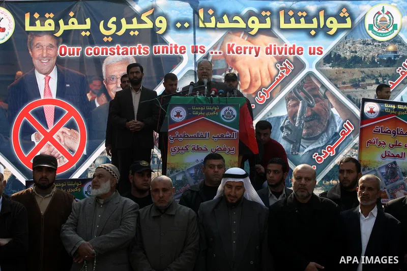 Palestinian Hamas and Islamic Jihad leaders take part in a protest in the Jebaliya refugee camp, the northern Gaza Strip, Friday, Feb. 7, 2014. The protesters chanted slogans against the peace talks with Israel. Photo by...