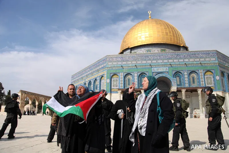 Israeli policemen stand in front of the Dome of the Rock during clashes with stone-throwing Palestinians after Friday prayers on the compound known to Muslims as Noble Sanctuary and to Jews as Temple Mount in Jerusalem's...