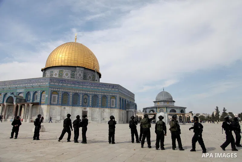 Israeli policemen stand in front of the Dome of the Rock during clashes with stone-throwing Palestinians after Friday prayers on the compound known to Muslims as Noble Sanctuary and to Jews as Temple Mount in Jerusalem's...