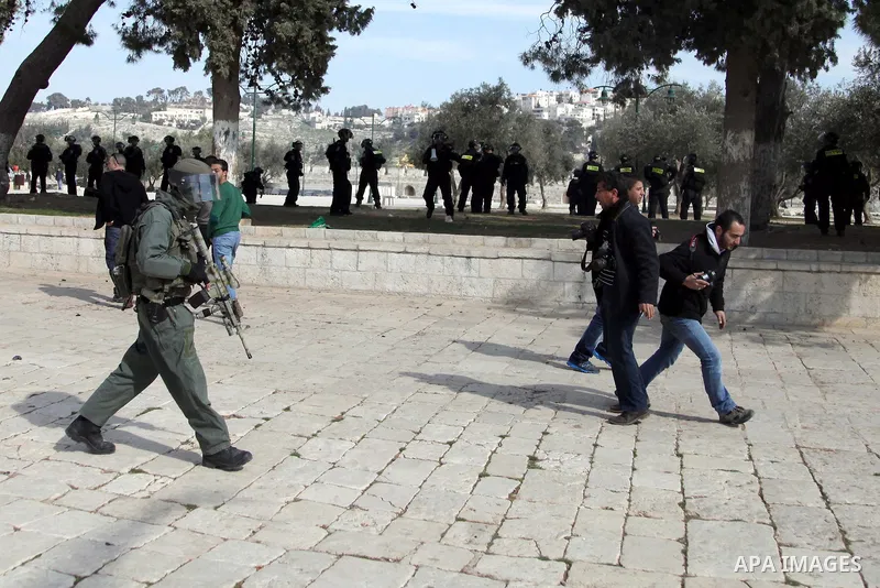 Israeli policemen stand in front of the Dome of the Rock during clashes with stone-throwing Palestinians after Friday prayers on the compound known to Muslims as Noble Sanctuary and to Jews as Temple Mount in Jerusalem's...