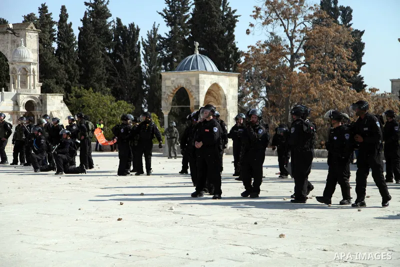 Israeli policemen stand in front of the Dome of the Rock during clashes with stone-throwing Palestinians after Friday prayers on the compound known to Muslims as Noble Sanctuary and to Jews as Temple Mount in Jerusalem's...