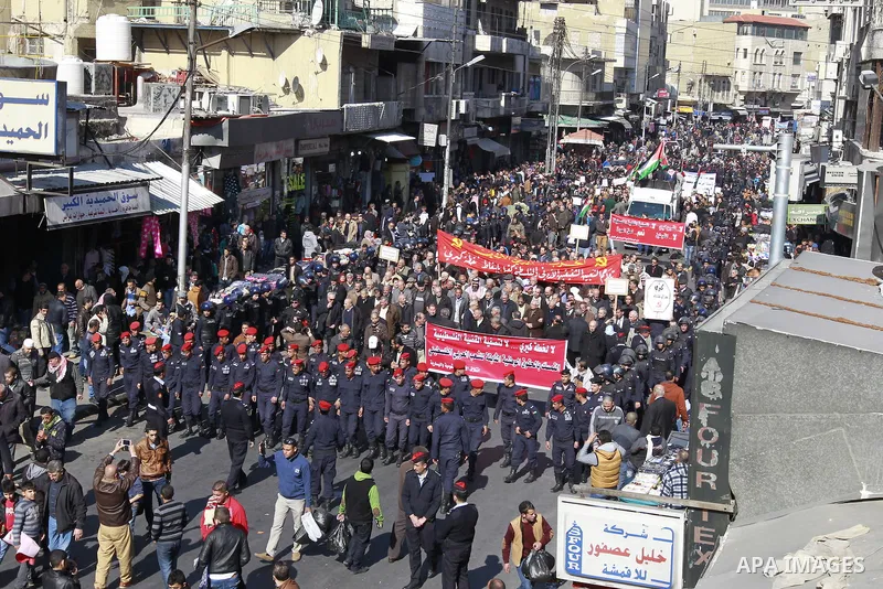 Jordanian activists take part in a demonstration against US Secretary of State John Kerry and his peace proposal, in Amman on February 7, 2014. Kerry is pressing Israel and the Palestinians to agree on a framework to gui...