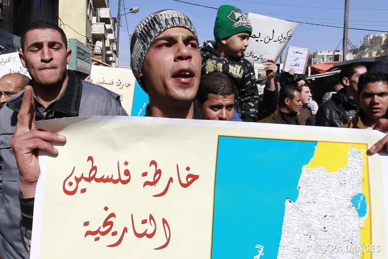 Jordanian activists take part in a demonstration against US Secretary of State John Kerry and his peace proposal, in Amman on February 7, 2014. Kerry is pressing Israel and the Palestinians to agree on a framework to gui...