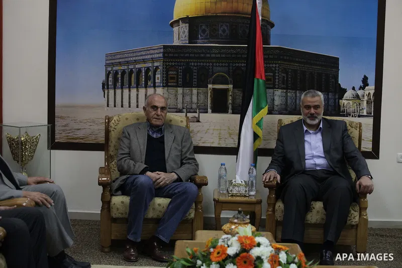 Palestinian Prime Minister in Gaza strip Ismail Haniyeh meets with businessman Munib al-Masri in Gaza city on Feb. 08, 2014. Photo by Ashraf Amra