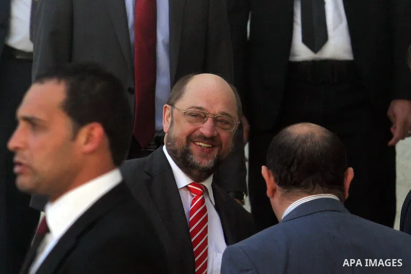 European Parliament President Martin Schultz waves as he arrives to meet Palestinian Authority President in the West Bank city of Ramallah on February 10, 2014. Schultz is on an official visit to the Middle East until Fe...
