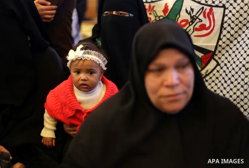 Palestinians take part in a protest demanding the release of their relatives prisoners held in Israeli jails, in front of the Red Cross office in Gaza City, on Feb. 10, 2014. Photo by Ashraf Amra