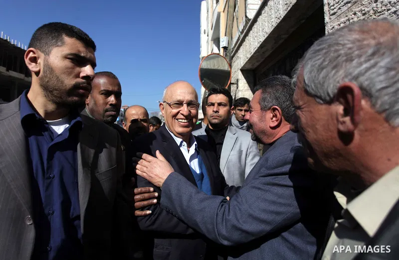 The member of Fatah Central Committee Nabil Shaath attends the weekly protest demanding the release of prisoners held in Israeli jails, in front of the Red Cross office in Gaza City, on Feb. 10, 2014. Photo by Ashraf Amr...