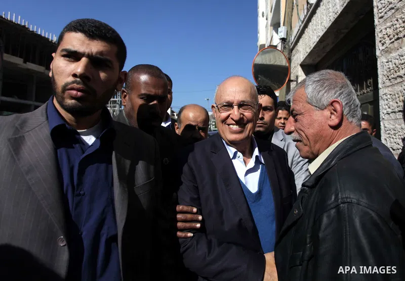 The member of Fatah Central Committee Nabil Shaath attends the weekly protest demanding the release of prisoners held in Israeli jails, in front of the Red Cross office in Gaza City, on Feb. 10, 2014. Photo by Ashraf Amr...