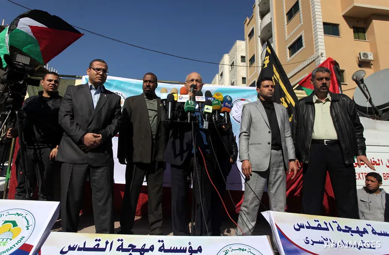 The member of Fatah Central Committee Nabil Shaath attends the weekly protest demanding the release of prisoners held in Israeli jails, in front of the Red Cross office in Gaza City, on Feb. 10, 2014. Photo by Ashraf Amr...