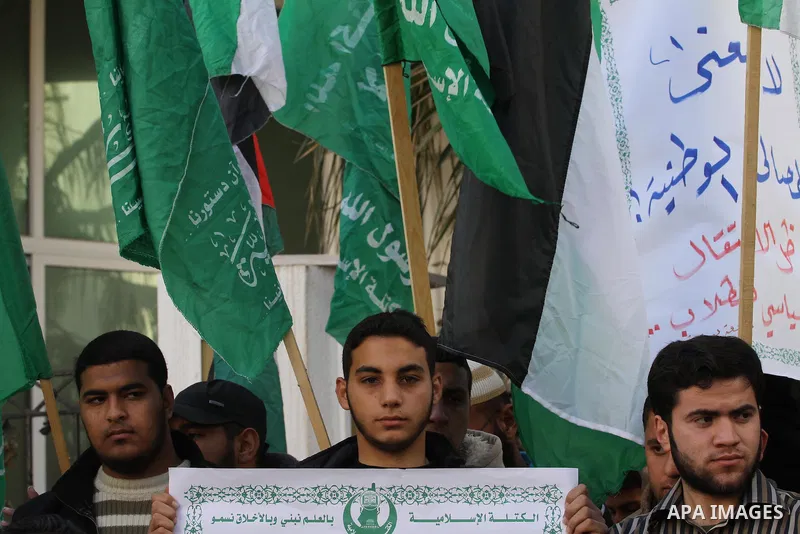 Palestinian members of the Islamic bloc take part in a protest against political arrests in the West Bank, Gaza City, on February 11, 2014. Photo by Mohammed Asad
