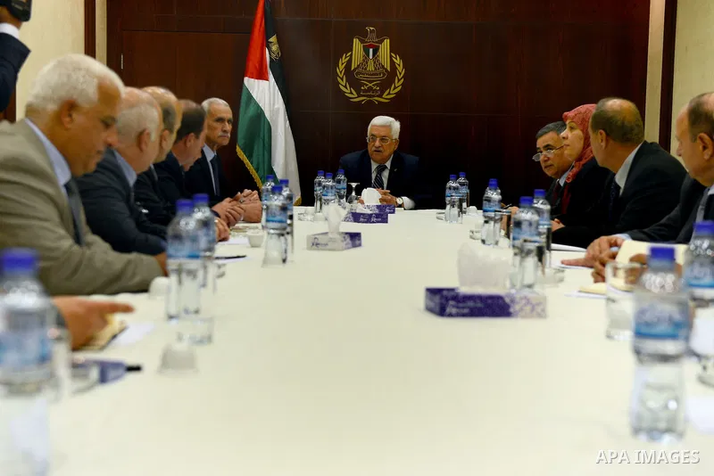 Palestinian President Mahmoud Abbas meets with the Governors of West Bank cities, in the West Bank City of Ramallah, February 11, 2014. Photo by Thaer Ganaim