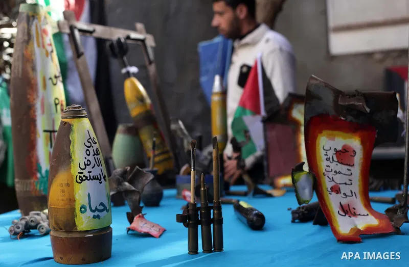 Palestinian Mohammed al-Zomar, 32 works on the remains of Israeli ammunition at his studio in the central Gaza Strip February 12, 2014. Al-Zomar draws and paints on remains of Israeli ammunition that he collected during...