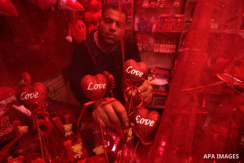A Palestinian vendor displays gifts at his store ahead of Valentine's day in Gaza City on February 12, 2014. Valentine's Day is increasingly popular among younger Palestinians, many of whom have taken up the custom of gi...