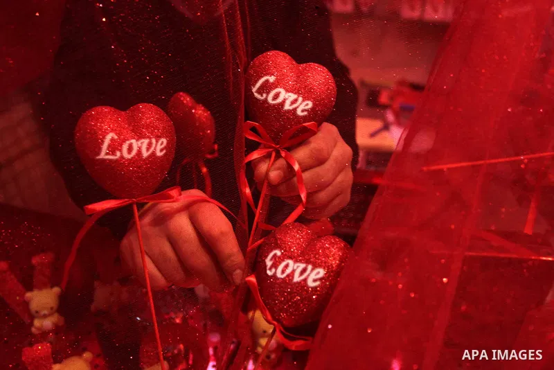 A Palestinian vendor displays gifts at his store ahead of Valentine's day in Gaza City on February 12, 2014. Valentine's Day is increasingly popular among younger Palestinians, many of whom have taken up the custom of gi...