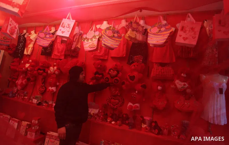 A Palestinian vendor displays gifts at his store ahead of Valentine's day in Gaza City on February 12, 2014. Valentine's Day is increasingly popular among younger Palestinians, many of whom have taken up the custom of gi...