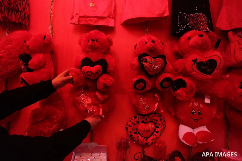 A Palestinian vendor displays gifts at his store ahead of Valentine's day in Gaza City on February 12, 2014. Valentine's Day is increasingly popular among younger Palestinians, many of whom have taken up the custom of gi...