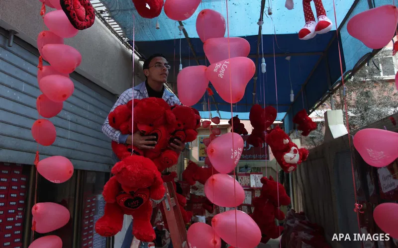 A Palestinian vendor displays gifts at his store ahead of Valentine's day in Gaza City on February 12, 2014. Valentine's Day is increasingly popular among younger Palestinians, many of whom have taken up the custom of gi...