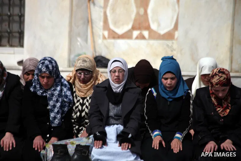 Palestinian worshipers attend Friday prayers at the Al-Aqsa compound, Islam's third holiest site, in the old city of Jerusalem February 14, 2014. Photo by Saeed Qaq