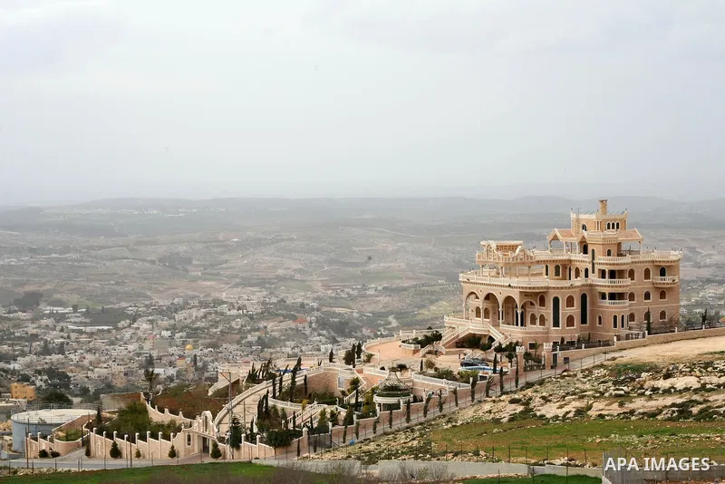 A picture shows of the Chinese palace on a mountain village of Kharas northwest the West Bank city of Hebron, on Feb. 15, 2014. Called by that name because it is such as the Chinese design palaces. Photo by Mamoun Wazwaz