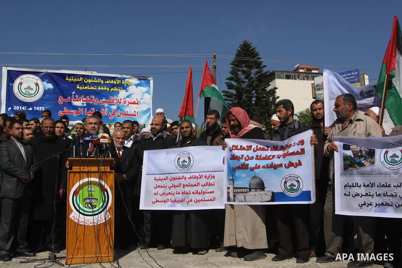 Palestinian Minister of Awqaf and Religious Affairs, Ismail Radwan, speaks in a Press conference during a protest to show solidarity for the Al-Aqsa mosque in Jerusalem and Persecution of Muslims in Central Africa in Gaz...