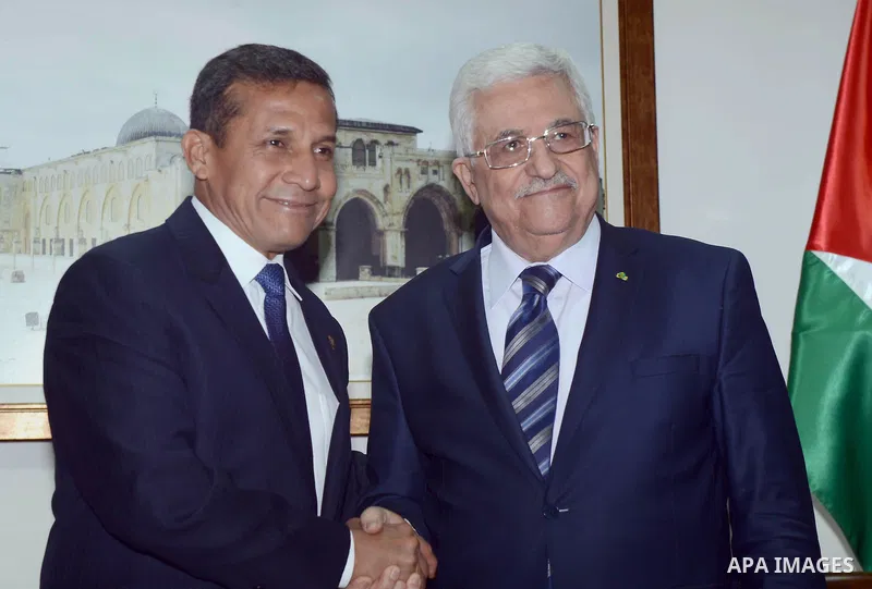 Palestinian Authority President Mahmud Abbas (R) meets with the Peru's President Ollanta Humala in the West Bank city of Ramallah February 18 2014. Peruvian President Ollanta Humala is on an official visit to the Palesti...