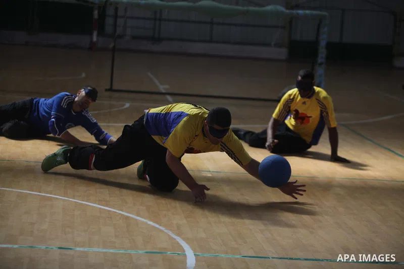 Palestinian blind goalball players compete during a training course, in Gaza city on Feb. 18, 2014. Photo by Ashraf Amra