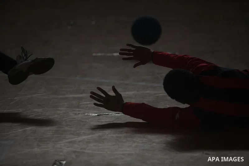 Palestinian blind goalball players compete during a training course, in Gaza city on Feb. 18, 2014. Photo by Ashraf Amra